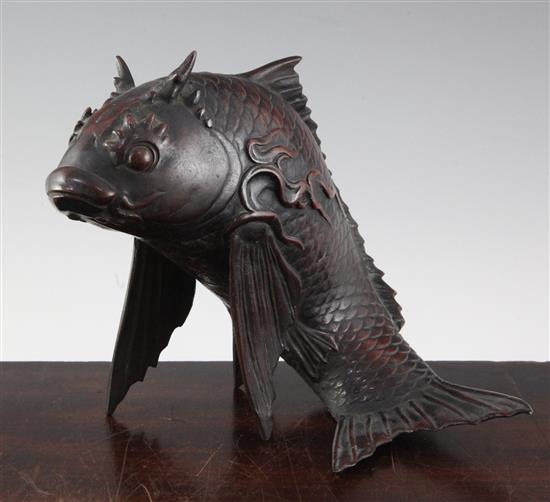 A Japanese brown patinated bronze model of a carp, 19th century, height 18.5cm